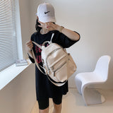 白色彷皮多層次拉鍊口袋設計功能性兩用後背包