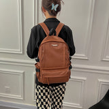 棕色彷皮多重拉鍊外袋調節帶設計大容量中性款後背包