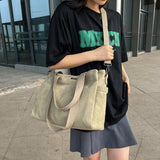 卡其色帆布休閒簡約前後磁扣口袋大容量中性款多用途拉鍊側背包