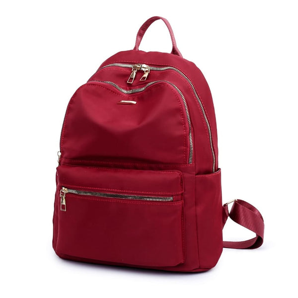 紅色尼龍多拉鍊口袋實用結構百搭耐用防水中性款後背包