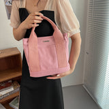 粉色帆布粗帶子手柄設計雙拉鍊隔層手提包