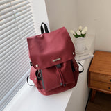 紅色尼龍束繩開口翻蓋款式多重實用袋設計中性款大容量後背包