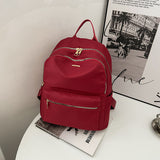 紅色尼龍多拉鍊口袋實用結構百搭耐用防水中性款後背包