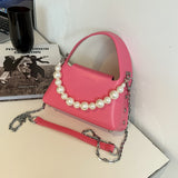桃紅色彷皮優雅人造珍珠掛飾設計圓釘細節闊手柄兩用斜背包
