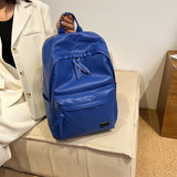 藍色彷皮前拉鍊口袋設計大容量後背包