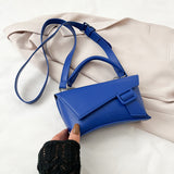 藍色彷皮搭扣帶設計斜坡形翻蓋手提斜背包
