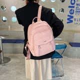 粉色彷皮雙拉鍊前翻蓋設計多重口袋超實用後背包
