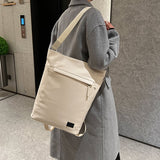 米白色彷皮前隱藏拉鍊設計簡約百搭大容量兩用水桶後背包