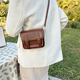 棕色彷皮經典款式雙搭扣帶磁扣翻蓋斜背包