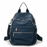藍色彷皮多層次拉鍊口袋設計功能性兩用後背包