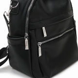 黑色彷皮多層次拉鍊口袋設計功能性兩用後背包